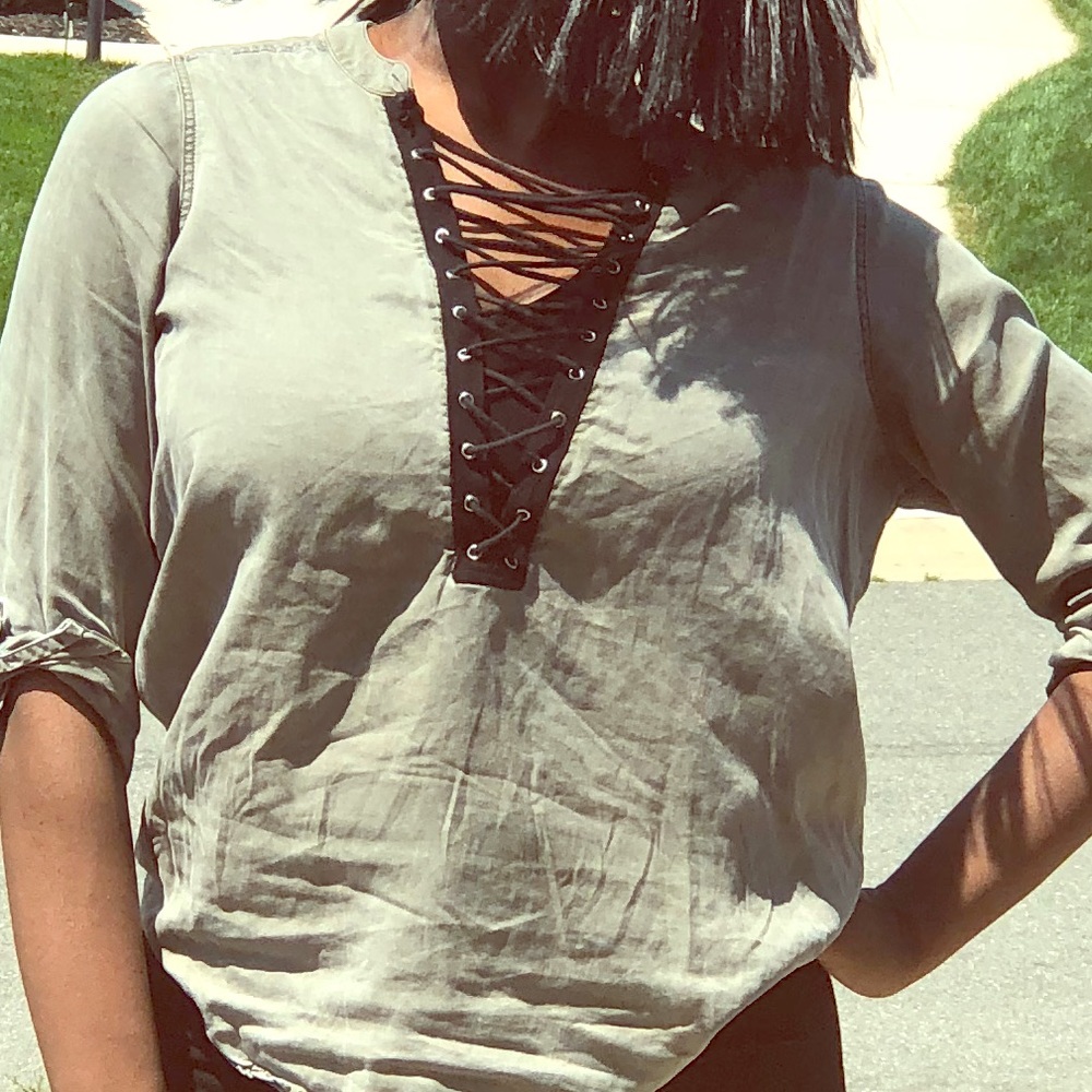 A green and black string shirt